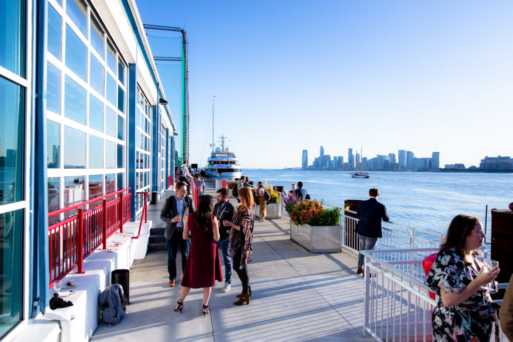 Guest enjoying the veranda by the Hudson River on a sunny day
