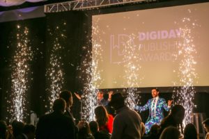 Sparklers going off onstage in front of presenter