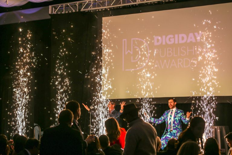 Sparklers going off onstage in front of presenter