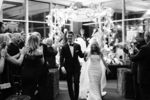 Bride and Groom walking down the aisle