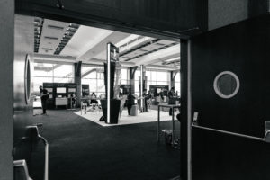 black and white picture taken from the foyer into Majestic where there exhibit booths