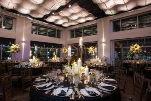 Dinner Tables set in Current, black linens