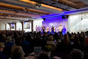 Chefs on stage at a meeting at Pier Sixty