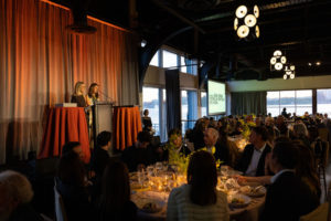 Speaker on Stage at The Lighthouse presenting