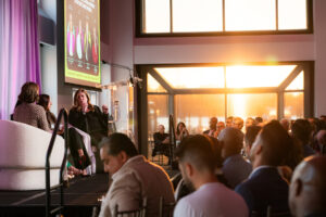 Current Meeting Presentation with stage over sunset