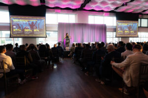 Current, Pier 59 Meeting speaker behind podium at The Pier Sixty Collection