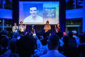 Michael Urie on stage at Current Pier 59 for the Queerty Pride Event
