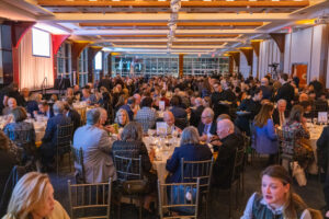 Guests are seated at their tables for the 2024 Commonweal Gala at Pier Sixty