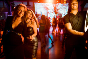 Parents using the Photobooth at Max Mitzvah at The Lighthouse