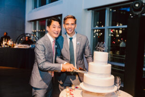Groom and Groom Cutting the Cake at Current, Pier 59