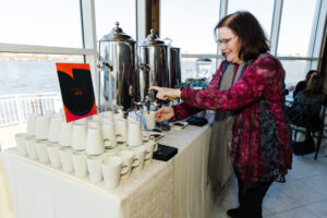 Guests getting a cup of coffee on the Lighthouse Terrace